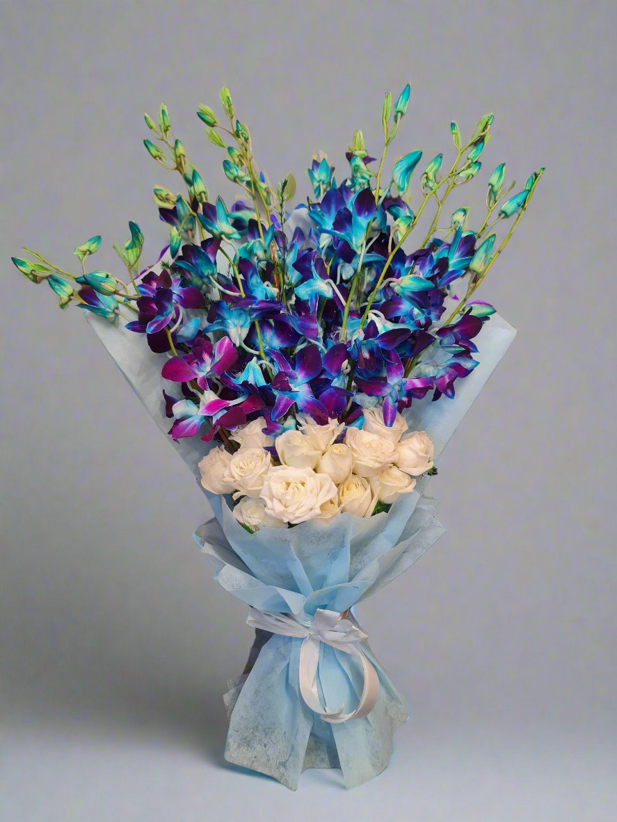 Blue Orchids and White Roses