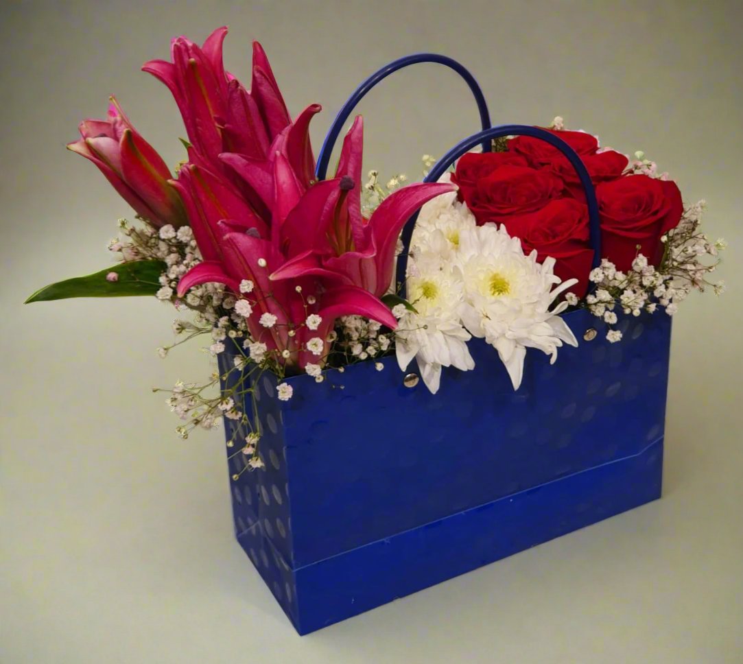 Enchanted Elegance: Pink Lilies with Red Roses